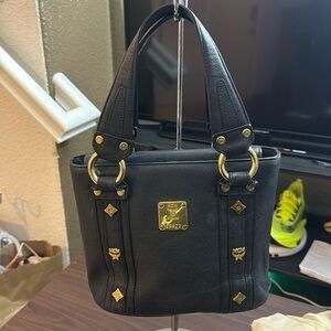 Authentic MCM Leather Handbag with gold studs